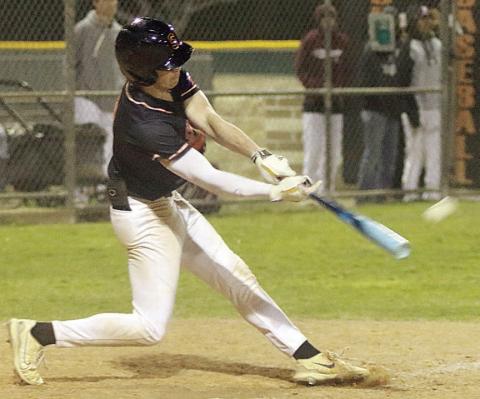 Jayse Janda connects for a base hit to drive in the game-winning run in the Shorthorns’ last at-bat against Flatonia. Sticker Photo By Darrell Vyvjala