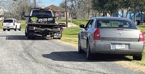 A silve r Chrysler 300 (right) eventually came to a stop after a pursuit in the Flatonia area by the Fayette County Undercover Narcotics Unit and the driver was subsequently arrested.