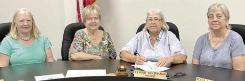 A proclamation designating June 1-7 as National Garden Week in Schulenburg was signed by Mayor Connie Koopmann (second from right), with Schulenburg Garden Club members (from left) Janet Murphy, Bonnie Baker and (right) Debbie Behlen in attendance.