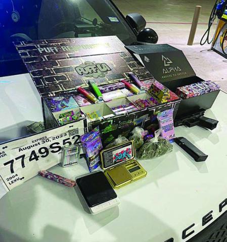 The items seized by the Schulenburg Police Department after a traffic stop on Aug. 22 are shown above, including the fake driver’s tag, drugs and drug paraphernalia, as well as a handgun.
