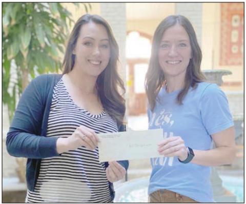 A $4,000 designated grant has been awarded by Fayette Community Foundation, represented by executive director Susannah Mikulin (left), to And Then a New Day, represented by founder Erin Wotipka (right).