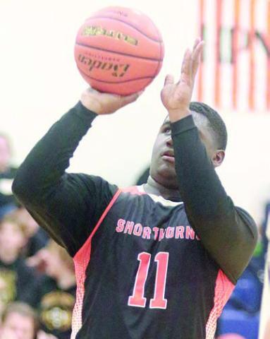 Tavondrick Ellison cans a free throw in the fourth quarter. Sticker Photo By Darrell Vyvjala