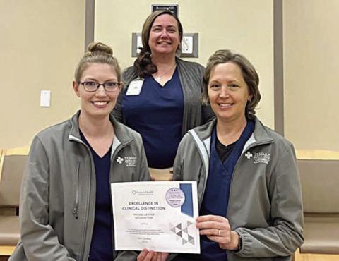 Staff at the St. Mark’s Advanced Outpatient Wound Center displaying the RestorixHealth recognition certificate includes (front row, from left) Jackie Faigle, FNP-C; Stacie Schramek, RN; and (back)Jennifer Scott, RN, program director.