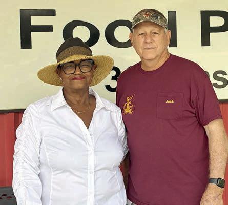 Schulenburg Area Food Pantry – (from left) Jacqueline Figg, NVCW, with Jack Niesner, Schulenburg Area Food Pantry.