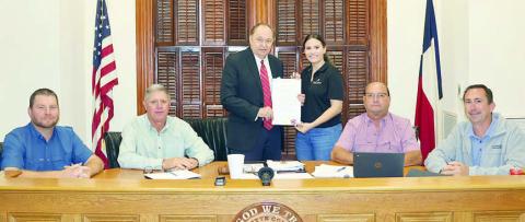Court signs Autism Acceptance Month proclamation