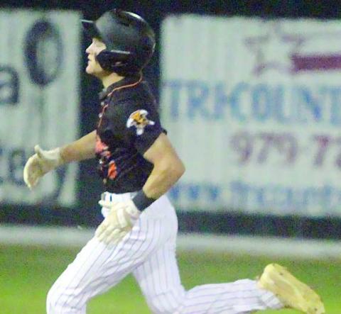 Reid Janda heads around second base on his way to a triple in the Horns’ win over Weimar. Sticker Photo By Darrell Vyvjala
