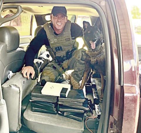 During a traff ic stop on I-10 at Flatonia, Sgt. Randy Thumann and K-9 Kolt located 13 kilos of Fentanyl in the rear seat back and speaker box of a Chevrolet Silverado.