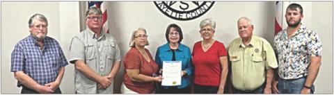 Proclamation signed – On hand as a proclamation for National Voter Registration Day was signed at the Schulenburg City Council meeting were (from left) Alderman Clarence Ahlschlager, Alderman Frank Wick III, Mayor Connie Koopmann, League of Women Voter representatives Helen Niesner and Catherine Burns, Alderman Larry Veselka and Alderman Scott Stoner.