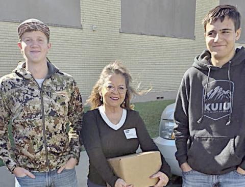 Presentation at Schulenburg High School – (from left) Tayt Wenske, Reneemarie Hranicky-Navidad Valley CattleWomen member and Jayden Olmos.