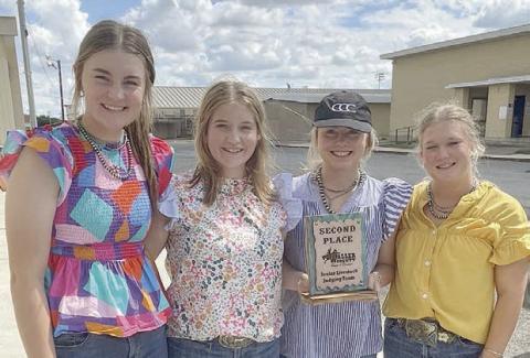 from left) Madyson Holub, Kyrroll Prihoda, Keeley Warnken and Haley Schramek