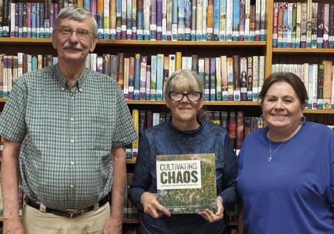 Garden Club donates book to library