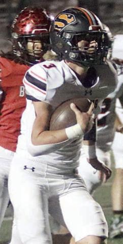 Aaron Janecek heads to the end zone on a 14-yard carry to put the Horns up 14-7. Sticker Photo By Layne Vyvjala
