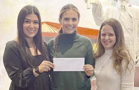 Grant pr esentation to Turt le Wing Foundation – (from left) Melanie Ramirez, representing Stanzel Family Foundation; Destiny Siptak, Turtle Wing executive director; and Cheryl Pekar, representing Stanzel Family Foundation.