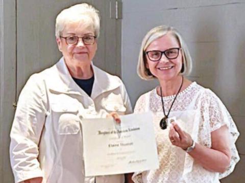 NSDAR COMMUNITY SERVICE AWARD recipient was author Elaine Thomas (right), shown with regent Sue Lane McCulley (left).