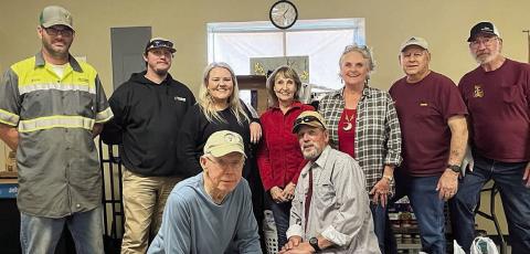 McCourt Equipment makes donation of food and cash to Food Pantry