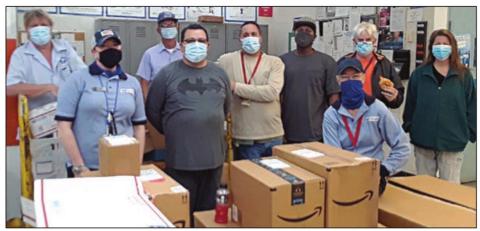 Schulenburg Post Office personnel include: (front, from left) Lisa Mederos, Frank Aguilar, Vicki Schrader; (back, from left) Ronny Supak, Phillip Bludau, Troy Barta, Marcus Coleman, Doug Stewart, and Keri Matejek.