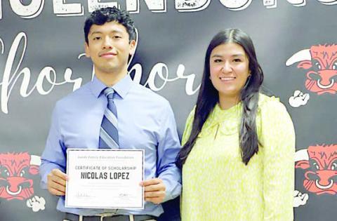 Nicolas Lopez (left), Schulenburg HIgh graduate, was selected to receive the 2024 Clark Scholarship. Presenter was Melanie Ramirez (right), Stanzel Family Foundation program director. The Stanzel Family Foundation partners with the Landa Family Educational Foundation in administering the scholarship.