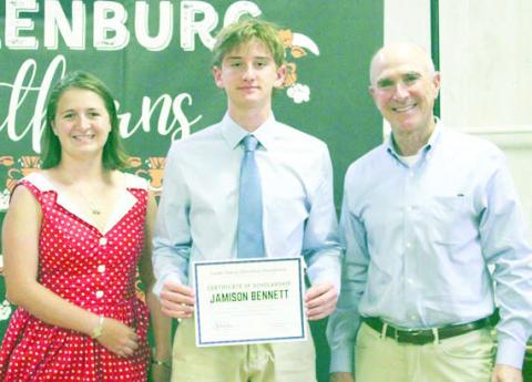 Jamison Benn ett (center), Schulenburg High graduate, was selected to receive the 2026 Clark Scholarship. Presenter was John C. Landa Jr. (right), Landa Family Education Foundation president, and also on hand was Liberty Killion (left), 2021 Clark Scholar. The Landa Family Educational Foundation partners with the Stanzel Family Foundation in administering the Clark Scholarship.