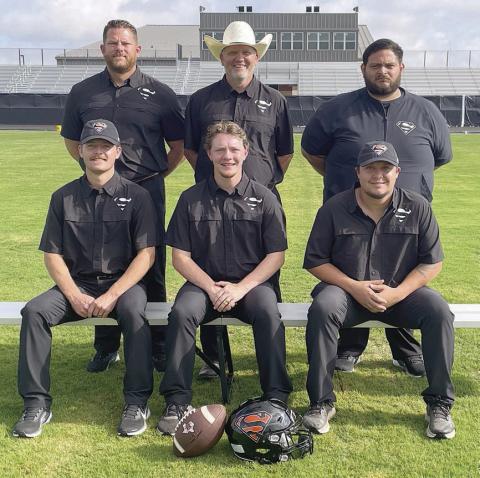 COACHING STAFF – Seated, from left: Jordan Hafley, Aaron Rowlett, and Marty Bigham. Standing, from left: Ben Vineyard, head coach &amp; Athletic Director Clay Ferguson, and Ricky Rodriguez. Not shown: Offensive coordinator Cameron Besetzny. STICKER PHOTOS BY DARRELL VYVJALA