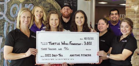 Turtle Wing Foundation was the recipient of a $3,000 donation as a result of the Dry-Tri. On hand were (front row, from left) Kim Bubela, Anytime Fitness Schulenburg; Deann Hooper and Destiny Psencik, Turtle Wing Foundation; Amanda Brown, Anytime Fitness Schulenburg; Anyssa Delagarza, Anytime Fitness Yoakum; (back row) Lauren Ralph, Anytime Fitness Schulenburg; Mitch Bailey, Anytime Fitness Schulenburg; and Abraham Centeno, Anytime Fitness Yoakum.