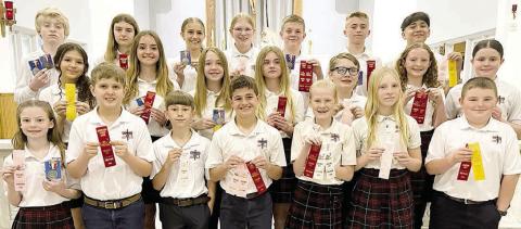 Grade 5-8 winners – (front row, from left) Rilee Wright, Levi Johnson, Barett Redman, Jack Schiffli, Briley Hartensteiner, Brynn Bubela, Abraham McBride, (middle row) Anna Oeding, Miranda Bonner, Reese Dusek, Mallory Bonner, Patrick Taylor, Caroline Bartek, Charlotte Schmidt, (back row) Allen Ballard, Valerie Sedlar, Jenna Guentert, Ashtyn Schaefer, Bo Brossmann, Weston Hollas and Max Hernandez.