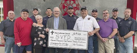 Zion Lutheran donates $7,224 to local fire department