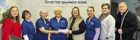 Fayette Savings Bank is holding a Matching Funds Campaign for the St. Rose of Lima Catholic School renovation project. On hand as KJZT-Praha presented a $200 donation were (from left) Brandi Rerich, FSB personal banker; KJZT representatives Phyllis Teykl, member, Georgia Cerny, president, and Patricia Masek, treasurer; Rosanne Gallia, St. Rose School principal; Nancy Jasek, KJZT secretary; Cheryl Brossmann, FSB lobby manager; and Very Rev. Jasper Liggio, St. Rose of Lima Catholic Church pastor.