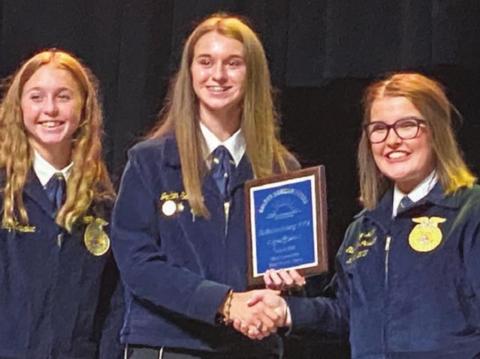 Golden Horizon – The Schulenburg FFA was recognized as one of the top chapters in the state with the designation of Golden Horizon Gold Emblem Chapter. Accepting the award were (from left) Harly Zapalac and Jordan Sommer.
