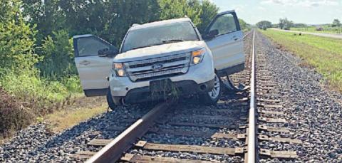 Chase through town ends on tracks