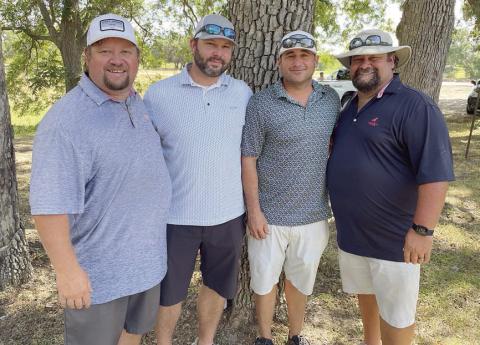 First Flight, First Place (15 under par / 57) – (from left) Kevin Kalina, Clayton Besetzny, Tommy Brown, and Pat Kalina. Sticker Photo By Darrell Vyvjala
