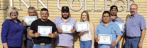 Six apprentice electricians have completed a Blinn College program preparing them for the journeyman electrician exam. Shown are (from left) Dr. Becky Garlick, Executive Dean of the Schulenburg campus; students Juan Toro, Daniel Uribe, Adam Guajardo, Deanna Langhamer, Luis Uribe-Flores and Anthony Perez; and Douglas Behlen, electrical and HVAC instructor.