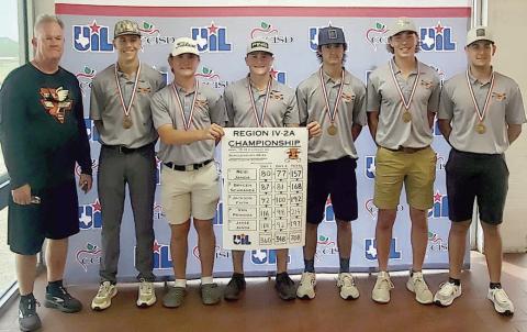 Shown with their score placard and third-place medals after the regional tournament are: (from left) head coach Richard Hoogendoorn, Van Prihoda, Brycen Schramek, Reid Janda, Brant Redman (alternate), Jayse Janda, and Jackson Faith.