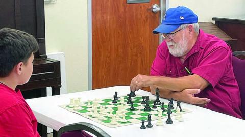 Learn & play chess at the local Public Library