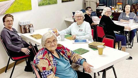 Really enjoying themselves during bingo were Cynthia Meyer, Alice Fajkus and Lillian Vanicek at the front table, and Cheri Wilson, Julie Hill and Faye Smith at the second table.