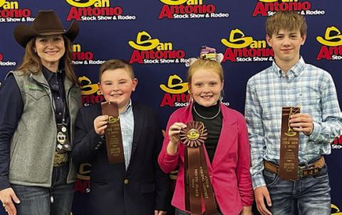 Placing ninth in livestock judging at the San Antonio Stock Show was the Fayette County 4-H Junior Maroon Team. Shown are (from left) stock show representative, Abraham McBride, Kaisley Janecka and Kullen Kutac. Not shown is Rheagan Karisch.