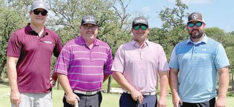GOLF TOURNEY WINNERS – Chuck Brown Ford team of (from left) Adam Besetzny, Kenny Helmcamp, Tommy Brown and Clayton Besetzny.