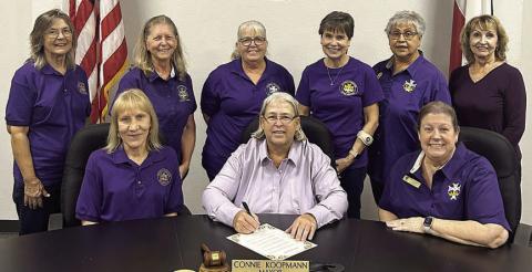 A proclamat ion-signing was held declaring Sunday, Oct. 20 as National Catholic Daughters Day. On hand were (front row, from left) vice regent Phyllis Venghaus, Mayor Connie Koopmann who signed the document, regent Grace Lebeda, (back row) Barbara Veselka, Wanda Doubrava, recording secretary Phyllis Valchar, Peggy Kalich, district deputy Rosa Galipp and treasurer Veronia Smith.