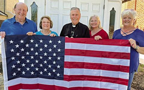 Catholic Life gives flag to St. Rose