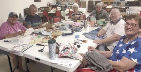 The Artful Friday slow stitch group, which recently started a new project, includes (from left) Annette Jasek, instructor Claire Lewis, Kim Penland, Kathy Carpenter, Kitra Ruiz and Berni Gillings.