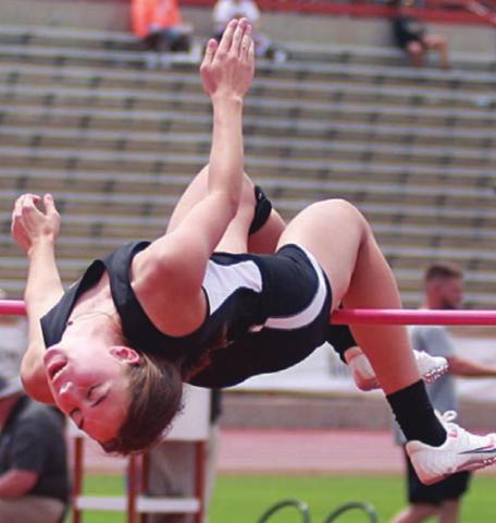 Meredith Magliolo successful clears 5-feet, 3-inches on her first attempt, which ultimately earned her a silver medal at state. Sticker Photo By Darrell Vyvjala