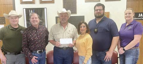 Polka Lovers Club of Texas Museum officers and Fayette County Sheriff’s Department personnel were on hand as the PLCTM presented a donation to the Deputy Santa Program. Shown are (from left) Kenn Kretz, deputy investigator; Gary Bucek, PLCTM president; Keith Korenek, Fayette County sheriff; Carol Artz-Bucek, PLCTM secretary|treasurer; Jeremy Castleberry, deputy investigator; and Angela Lala, FCSO sergeant.