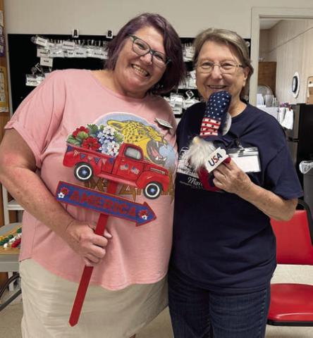 The lucky winn er of some great blackout bingo prizes was Mary Guenther (right), shown with Deannie Crim (left), who called the bingo game along with Reigan Schultz from Schulenburg Family Fitness Center.