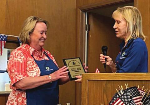 EXTRA MILE AWARD – Recipient Ginger Bosl (left) shown with PAT program director Phyllis Venghaus (right).