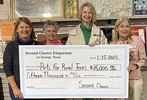 Arts for Rural Texas Chec k Present ation – (from left) Marlene Schnell, SCE assistant store director; Darlene Strahan, SCE assistant store director; Sandra Borne, ARTS executive director; and Gayle Schielack, SCE store director.