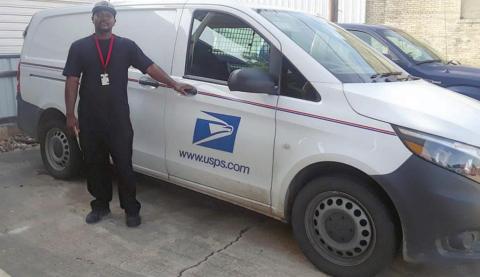 Rural Carrier Marcus Coleman is shown with the new Metris van assigned to R003.