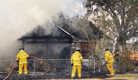 Round Top -Warr ento n firefight ers , along with firefighters from three other departments, worked the house fire on Monday, Oct. 13. Photo Courtesy of Fayette County Sheriff's Office