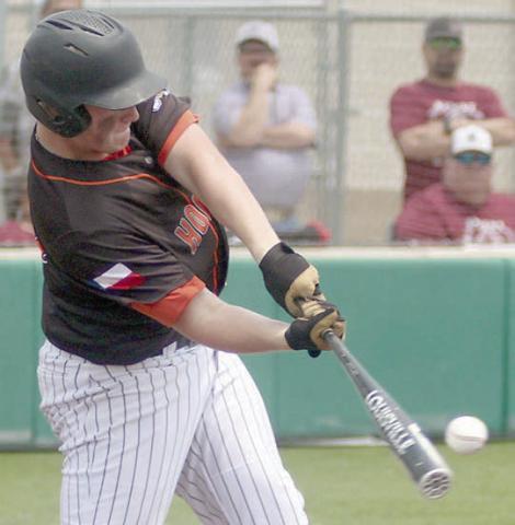 Connor Fogle connects for a grand slam home run in the first inning of game two. Sticker Photo By Darrell Vyvjala