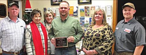 CITIZEN OF THE YEAR – Paul Zapalac (front, center) accepts the “Citizen of the Year” award from Chamber of Commerce representatives (from left) Gary Zweschper, Diana Mikesky, Jill Taber, (from right) Lukas Smrkovsky, and Ann McBride.