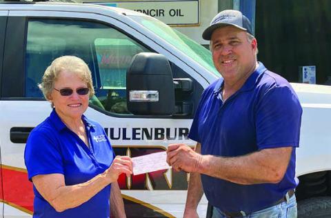 Moravia KJZT Society No. 44 held a “no bake bake sale” earlier this year for the “people helping people” community project. The proceeds were donated to help support the community, namely to the Hallettsville, Moulton and Schulenburg volunteer fire departments and Community Connections of Lavaca County. Presenting the check to the Schulenburg Volunteer Fire Department Chief Darren Guentert is Dorothy S. Henke, secretary of Moravia KJZT Society No. 44.