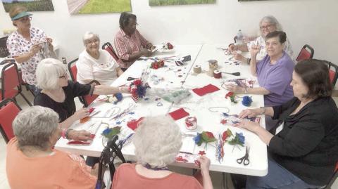 For AN art & CRAFTS class led by Martha Beckmann, Senior Connections had a full house, including (counterclockwise, starting at the back left of the table) Deborah Jones, Cynthia Meyer, Martha Beckmann, Kim Penland, Irene Janda, Jeanette Strait, Faye Smith, Julie Hill and Cherry Wilson.